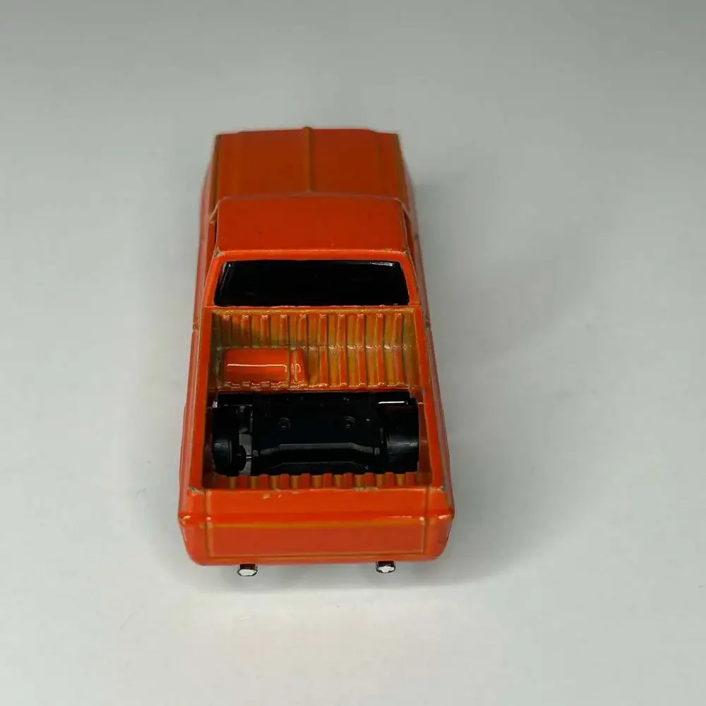 Hot Wheels 83 Chevy Silverado Orange Camouflage Truck